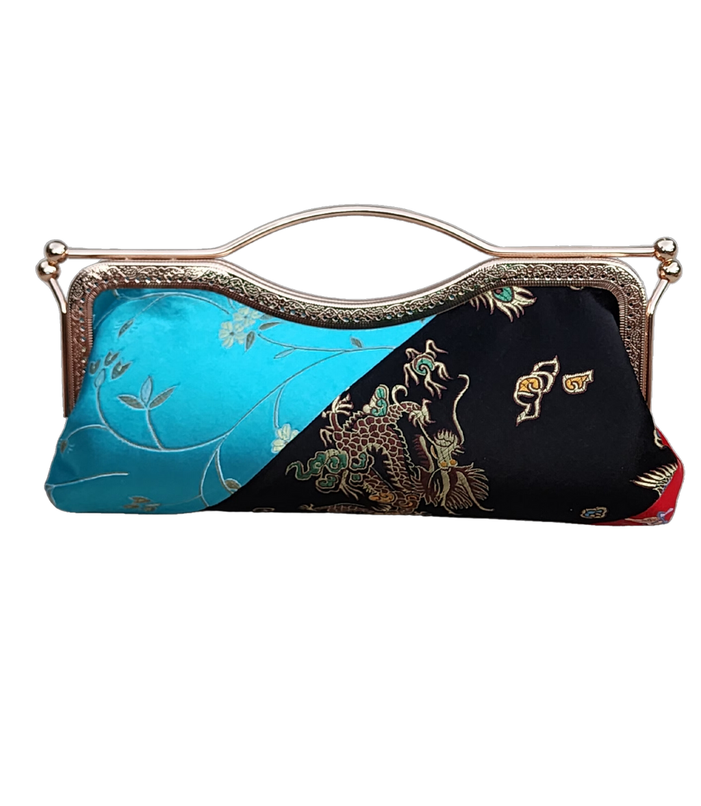 Nola & Eve Tranquil Fusion clutch in red, black, and turquoise brocade, handmade limited-edition statement bag