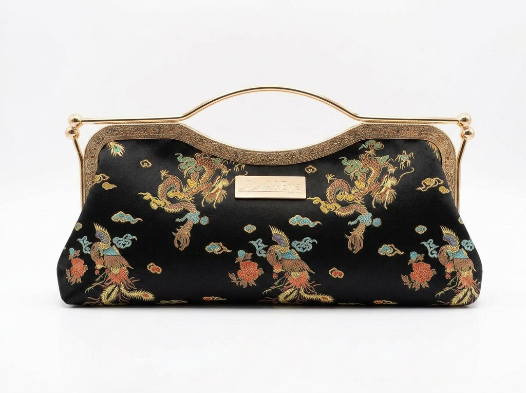 Phoenix Dynasty Contemporary Classic brocade clutch by Nola & Eve with dual kiss-lock gold frame and top handle