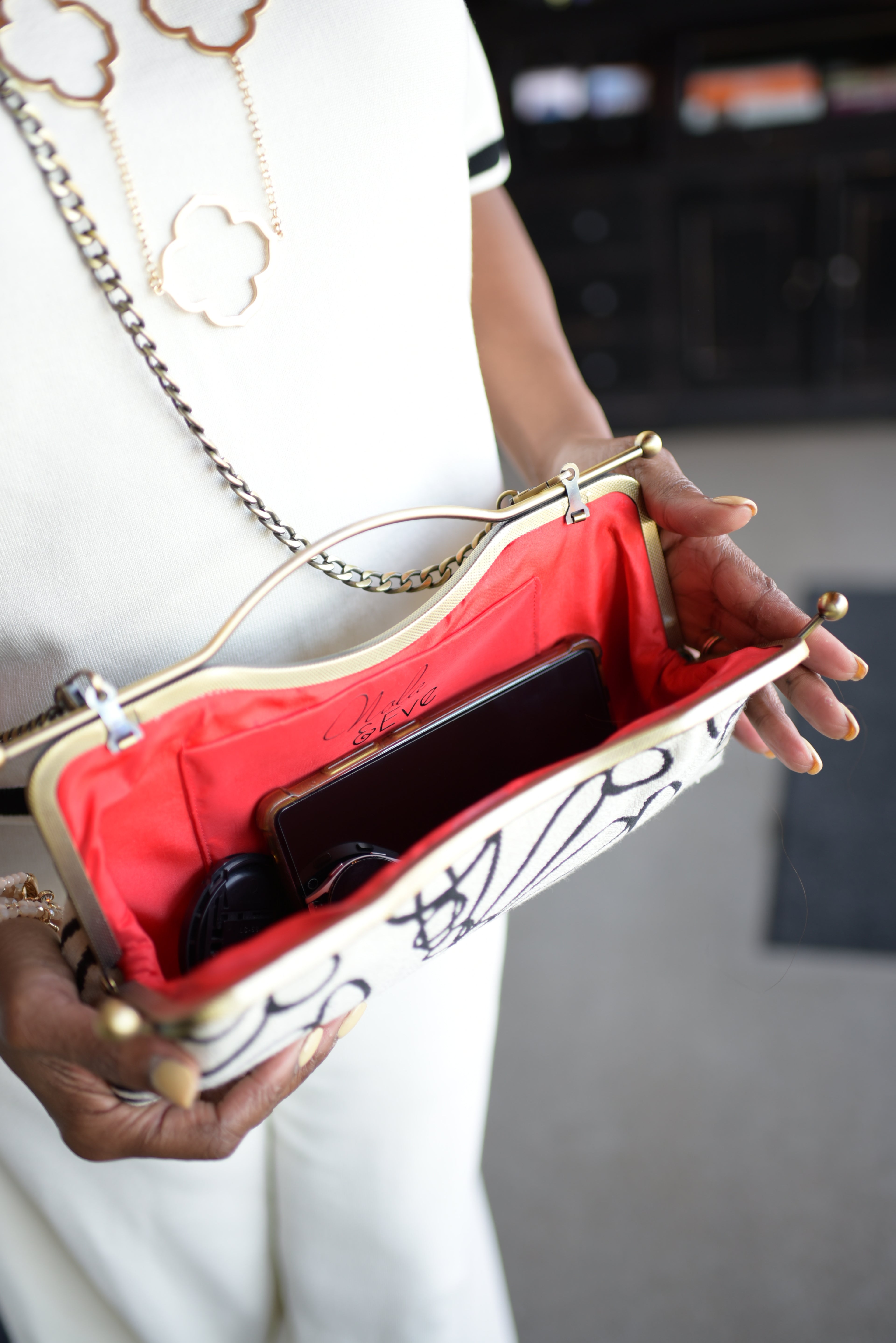 Nola & Eve Stormy Elegance handmade evening clutch with ball-snap closure and red lining