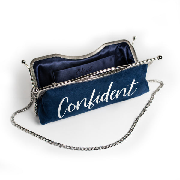 Nola & Eve Mood Suede customizable faux suede statement clutch with metal frame closure