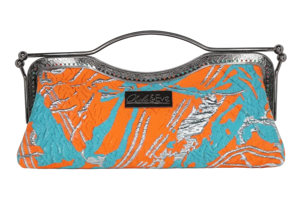 Nola & Eve Desert Mirage Classic statement clutch in richly woven brocade with top handle, satin lined