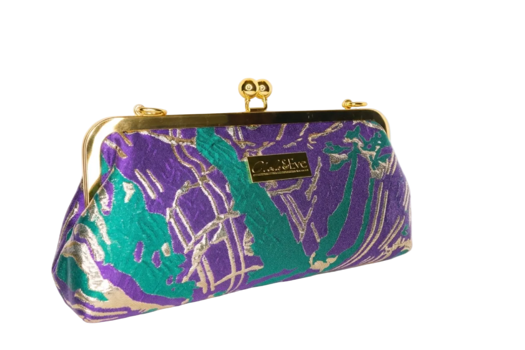 Desert Mirage Classic woven brocade clutch by Nola & Eve with structured frame and detachable chain strap