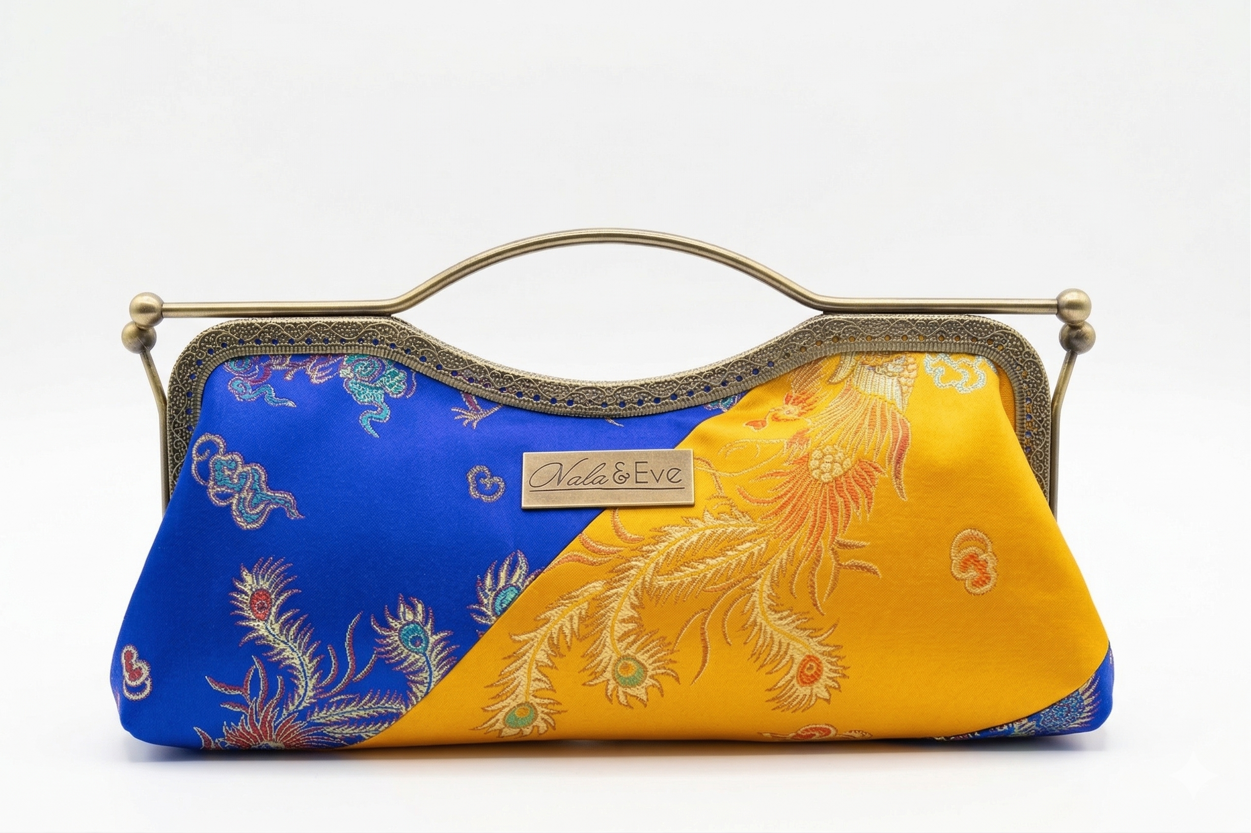 Nola & Eve Phoenix Dynasty Signature two-tone brocade clutch with gold ornate frame and phoenix-and-dragon detailing, limited-edition statement bag