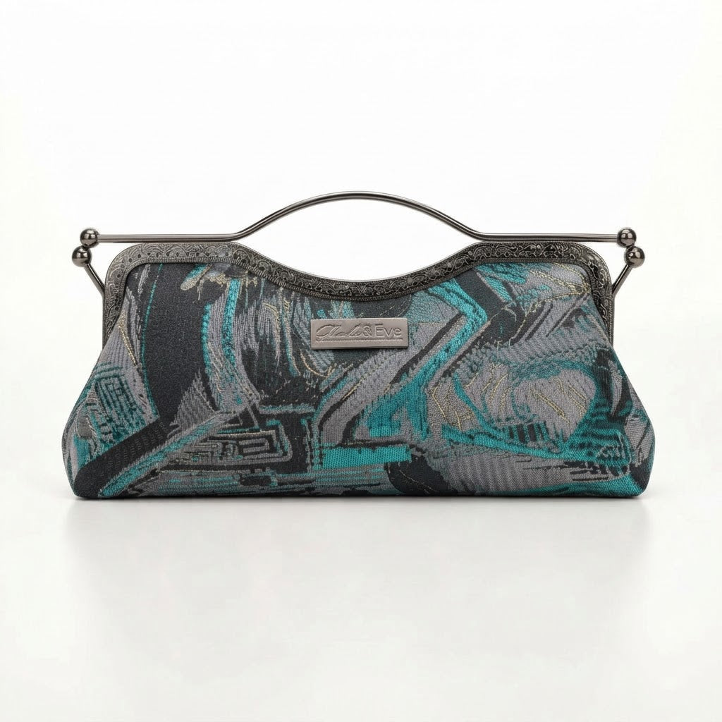 Nola & Eve Midnight Skyline Classic Contemporary clutch in dark gray and black with metallic teal accents, handmade limited-edition statement bag