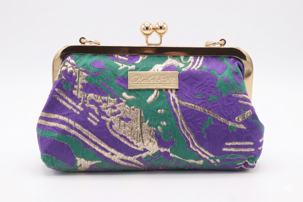 Nola & Eve Desert Mirage Classic statement clutch in richly woven brocade with top handle, satin lined