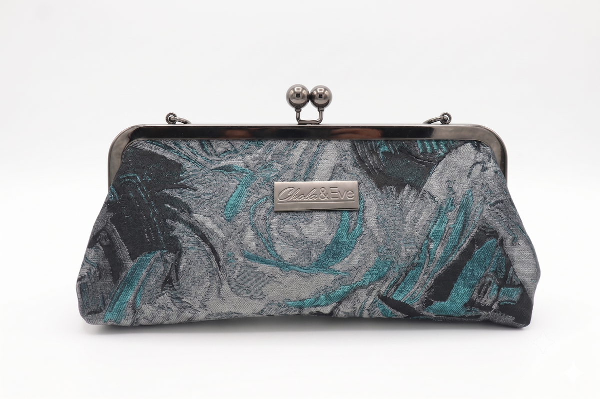 Nola & Eve Midnight Skyline Classic clutch in dark gray and black with metallic teal, handmade limited-edition statement bag