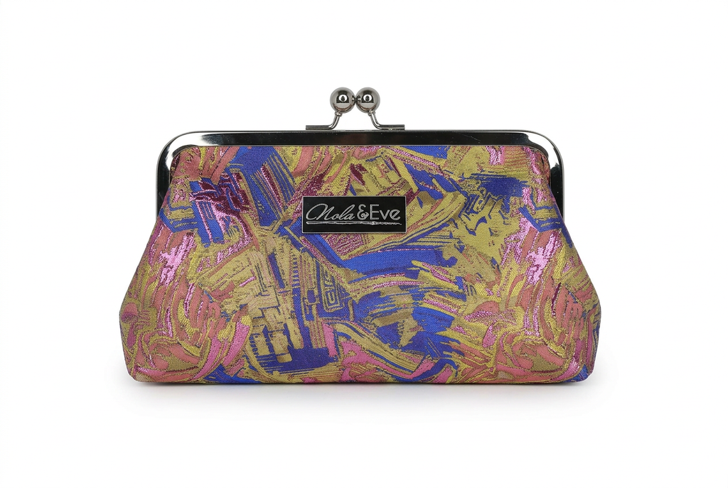 Midnight Skyline Classic woven brocade clutch by Nola & Eve with structured frame and detachable chain strap