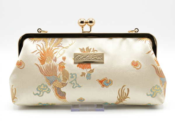Nola & Eve Phoenix Dynasty Classic limited-edition brocade clutch with phoenix-and-dragon detailing and satin lining