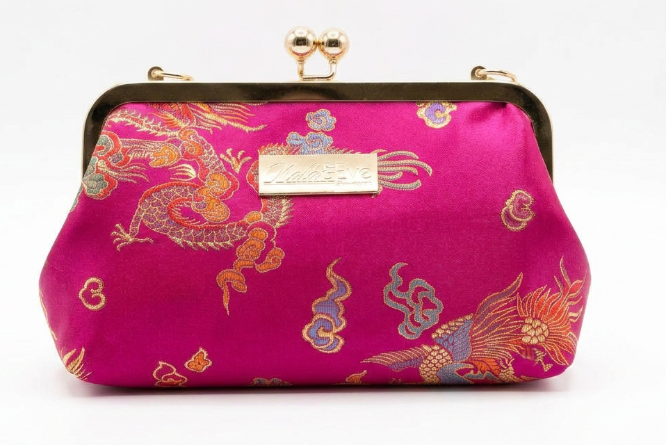 Nola & Eve Phoenix Dynasty Classic statement clutch in woven brocade with dual kiss-lock gold frame