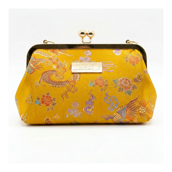 Phoenix Dynasty Classic brocade clutch by Nola & Eve, gold metal frame with top handle and phoenix-and-dragon design