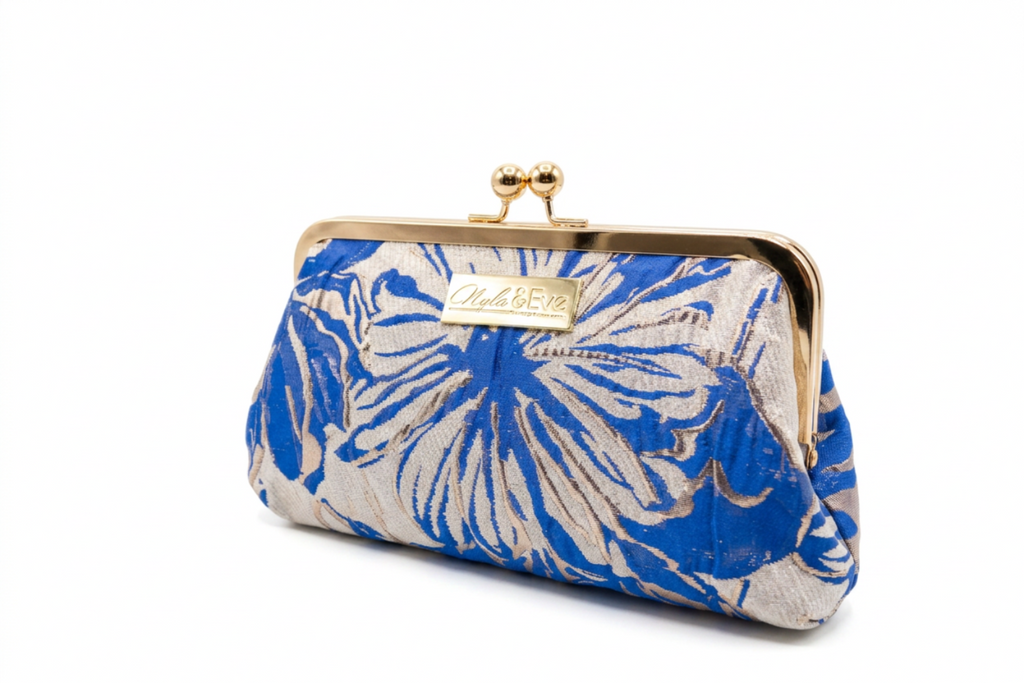 Nola & Eve Regal Bloom Classic handmade brocade clutch with floral artistry and gold kiss-lock frame, limited-edition statement bag