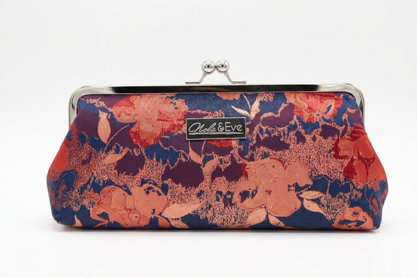 Nola & Eve Blossom Veil Classic statement clutch in floral woven brocade with top handle, satin lined