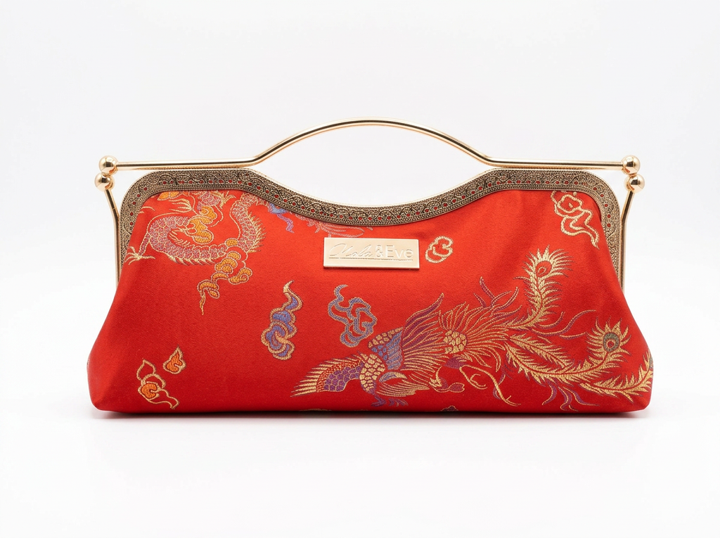 Nola & Eve Phoenix Dynasty Contemporary Classic handmade brocade clutch with gold ornate frame and phoenix-and-dragon embroidery, limited-edition statement bag