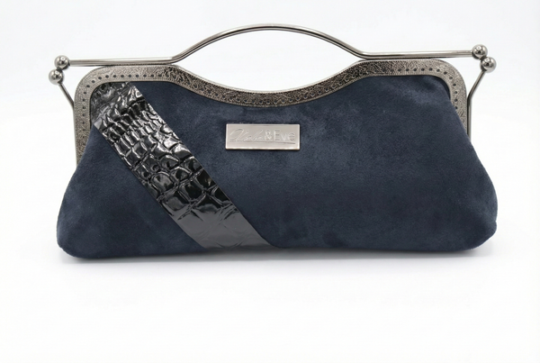 Nola & Eve Canyon Belle handmade western-inspired clutch with kiss-lock frame and satin lining