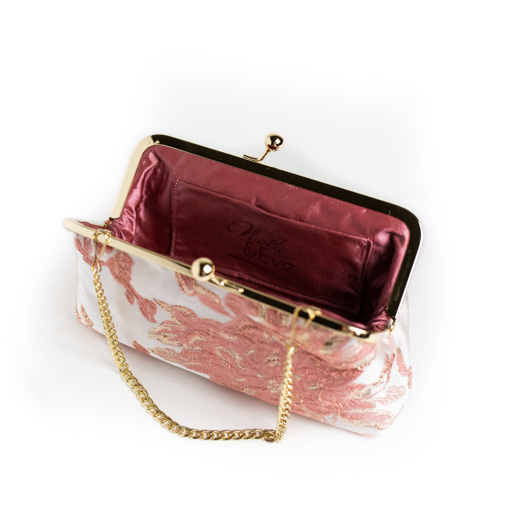 Pink and Mauve floral brocade clutch by Nola & Eve with gold ball clasp and dual chain straps