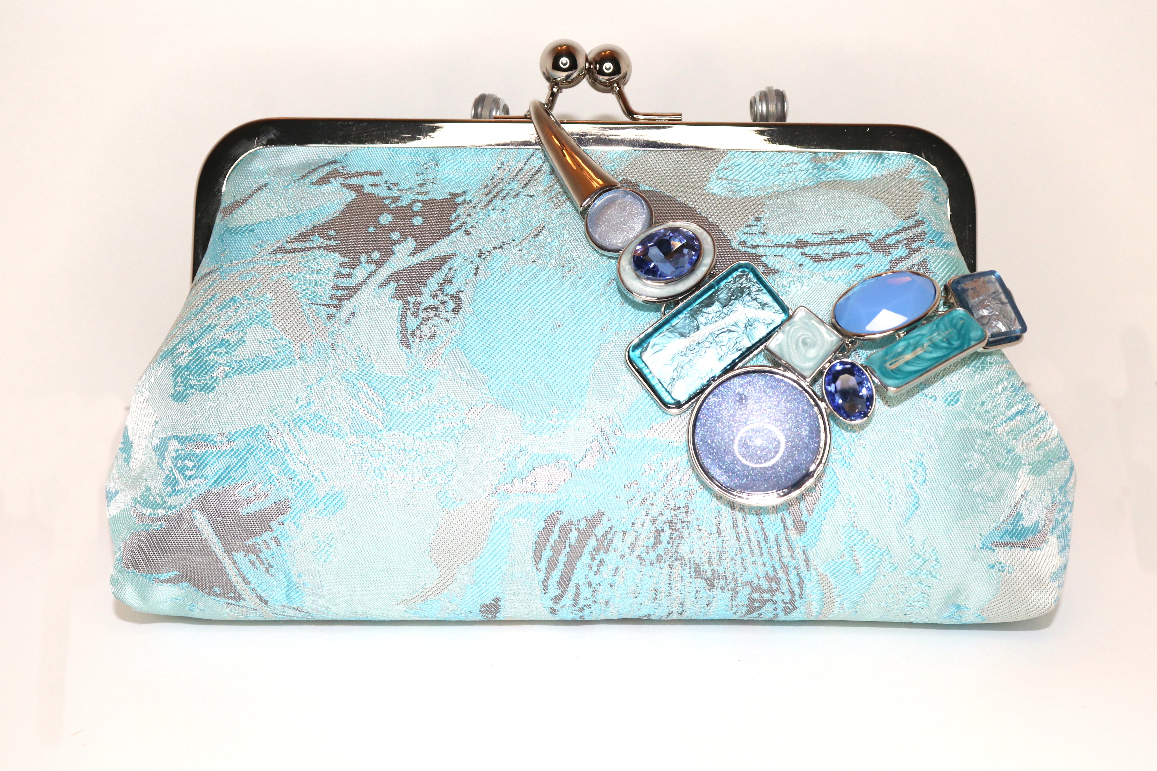 Abstract blue and silver brocade clutch by Nola & Eve, Turquoise and Silver design